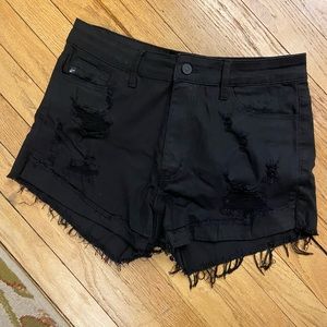 Black ripped shorts